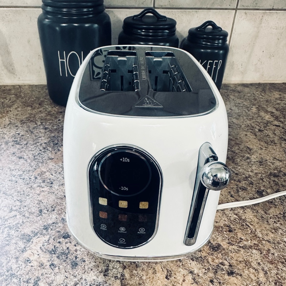 Sleek White and Black Toaster